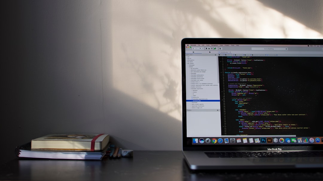 Laptop screen showing programming code representing hosting for freelance developers