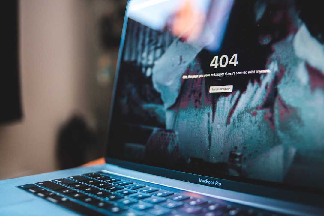 Black laptop showing error code representing website outage impact on business