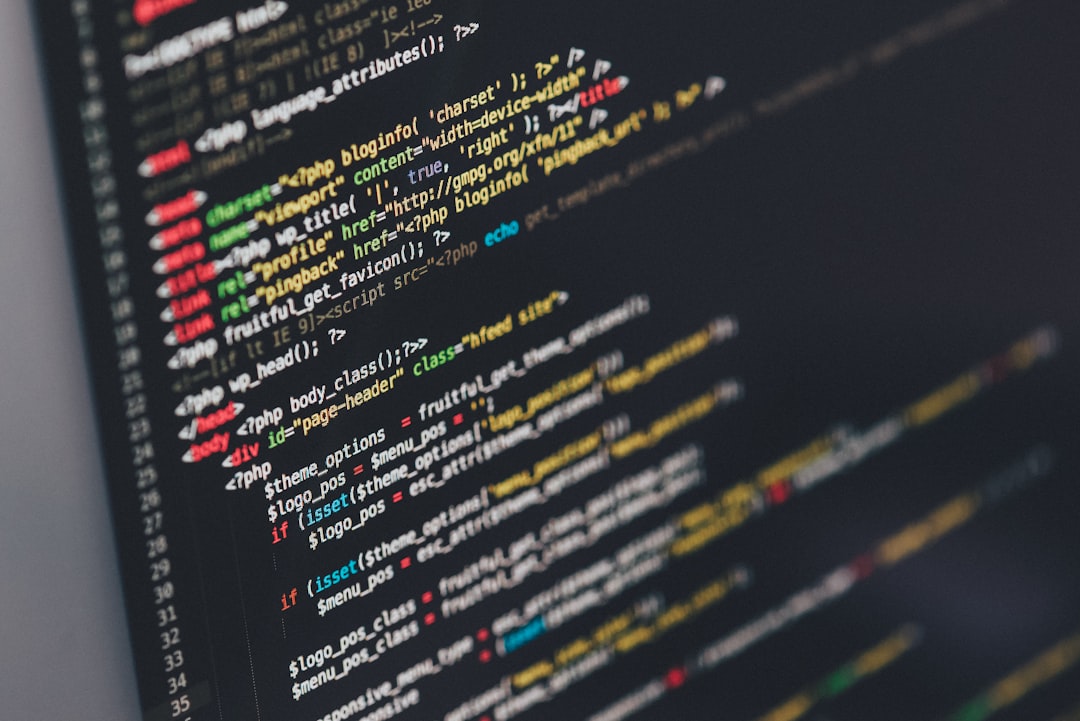 Monitor showing programming code representing WordPress staging site setup